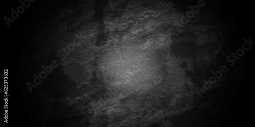 Black stone wall texture grunge rock surface. dark gray background backdrop. wide panoramic banner. old wall stone for dark black distressed grunge background wallpaper rough concrete wall.