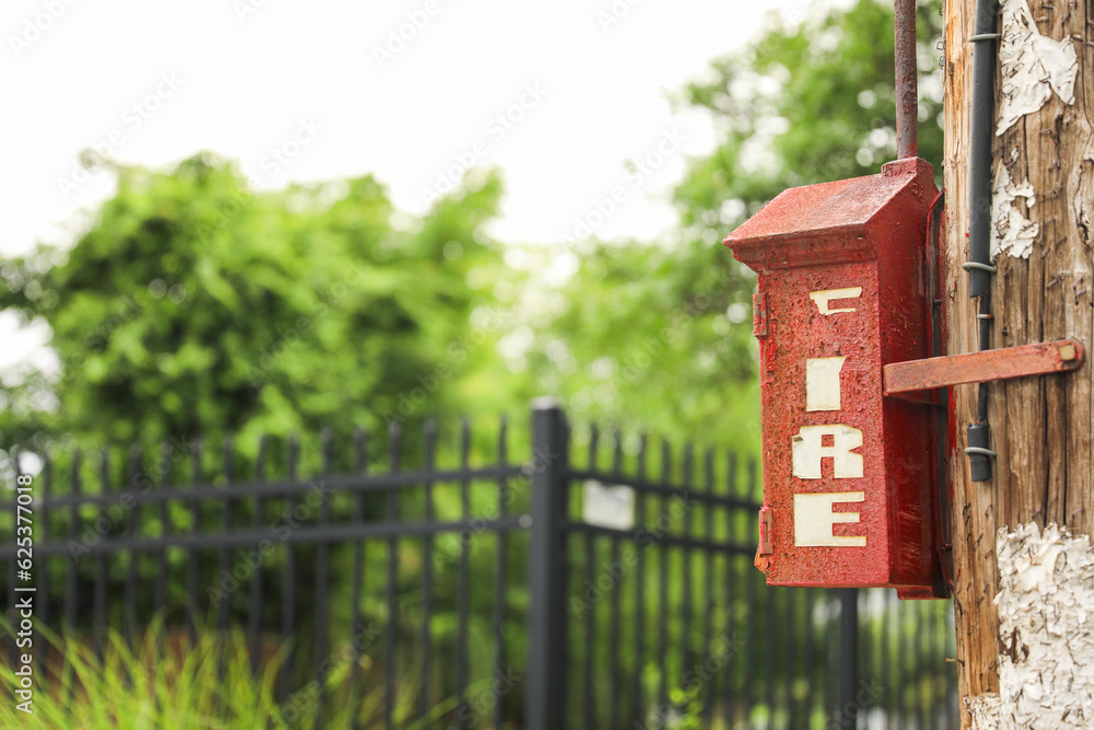 Vivid fire alarm, a symbol of caution and protection. Red-hot urgency to prevent disaster. Alertness, safety, and preparedness concept
