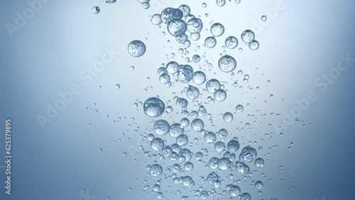 Oil drop falls into the water