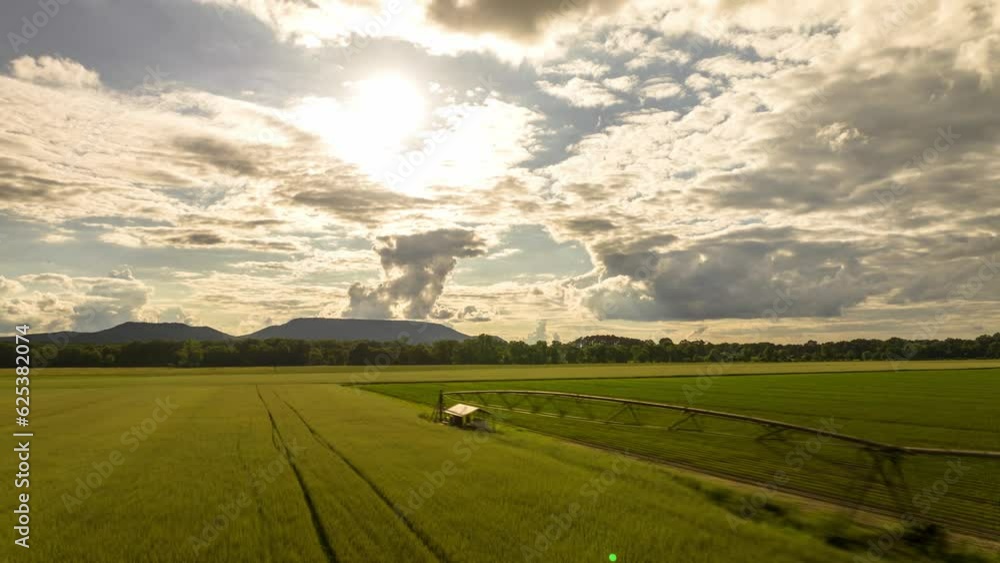 Sunset over agricultural fields along commercial crop sprinkler, Dardanelle, Arkansas, USA - Hyperlapse Sunset over agricultural fields along commercial crop sprinkler, Dardanelle, Arkansas, USA - Hyperlapse