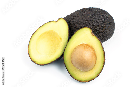 Avocado cut in half isolate on white background.