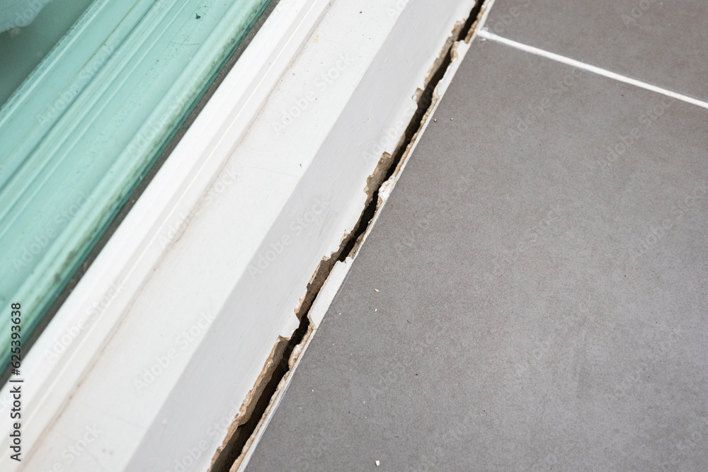 cracked concrete floor of the house cracked concrete floor of the house