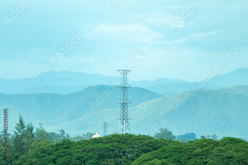 Electric power poles with power lines background