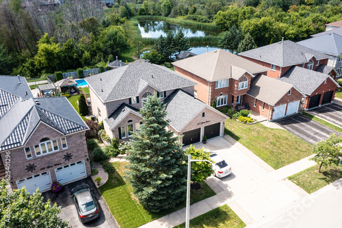 Discover the power of aerial imagery with our high-quality drone photos capturing stunning views of real estate houses in thriving Barrie, Ontario.  © contentzilla