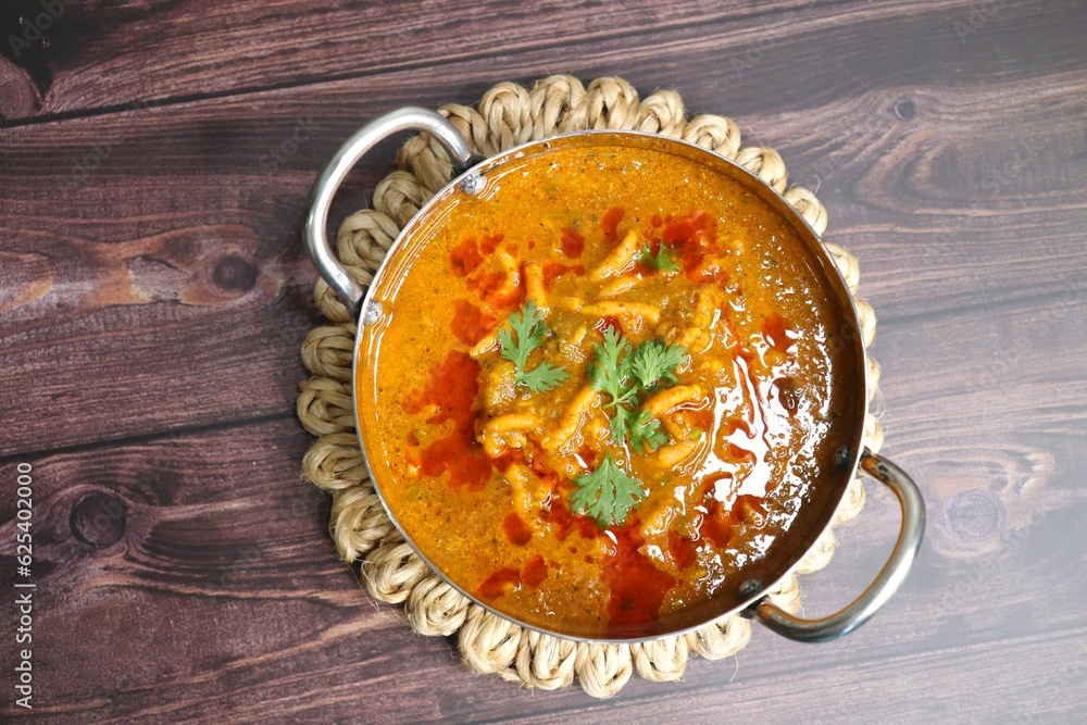 Traditional Sev bhaji or sev tamatar nu Shaak. its a sweet & spicy