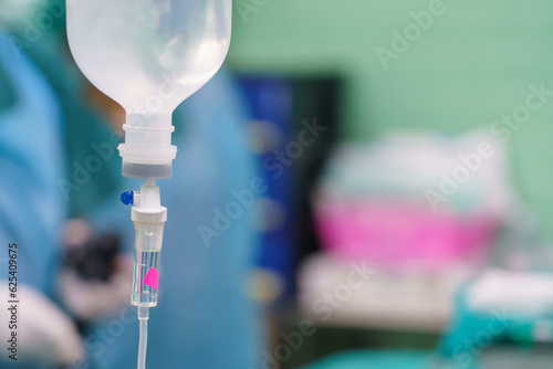 Canvas Print Normal saline solution or sodium chloride with infusion bottle drip for patient