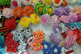 Hair clips and hair ties with handmade decorations. folk art as a style of life