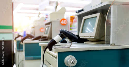 Empty checkout counter with terminal in supermarket