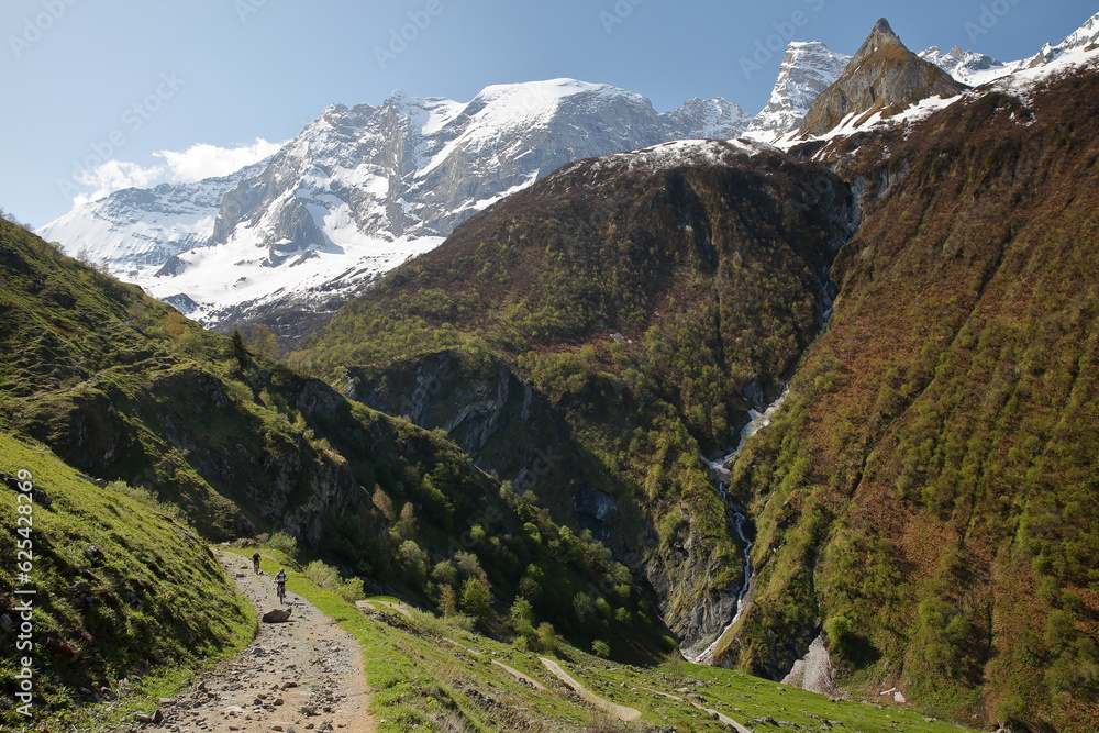 Naklejka premium A hiking trail leading to the Gliere Hut at the end of the valley of Champagny le Haut, Vanoise National Park, Northern French Alps, Tarentaise, Savoie, France, with the glacier Grande Motte 