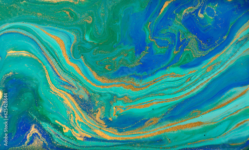 Liquid Flow of Gold and Blue Paint Pattern