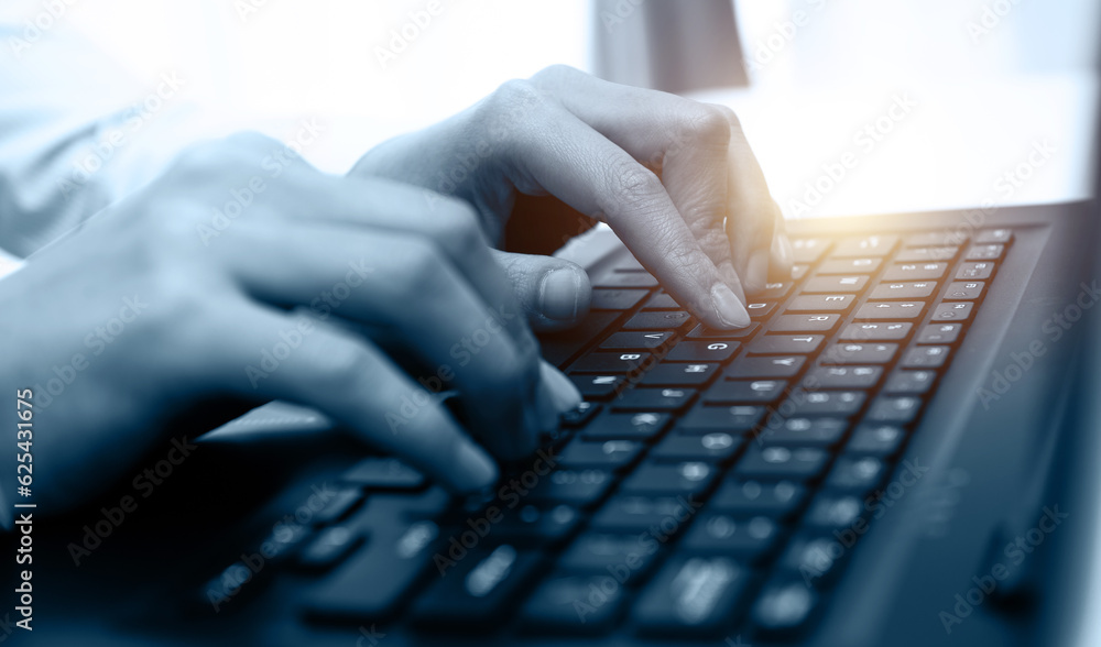 Closeup of woman hands working on laptop Closeup of woman hands working on laptop