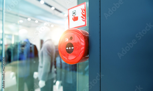 Obraz na plátně Manual push station of fire alarm system, installed on the wall of shopping cent