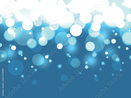 幻想的な青色のキラキラ輝くピンボケ背景