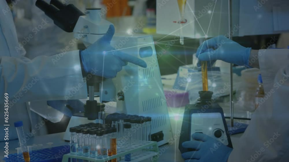 Animation of network of connections over diverse scientists in laboratory Animation of network of connections over diverse scientists in laboratory