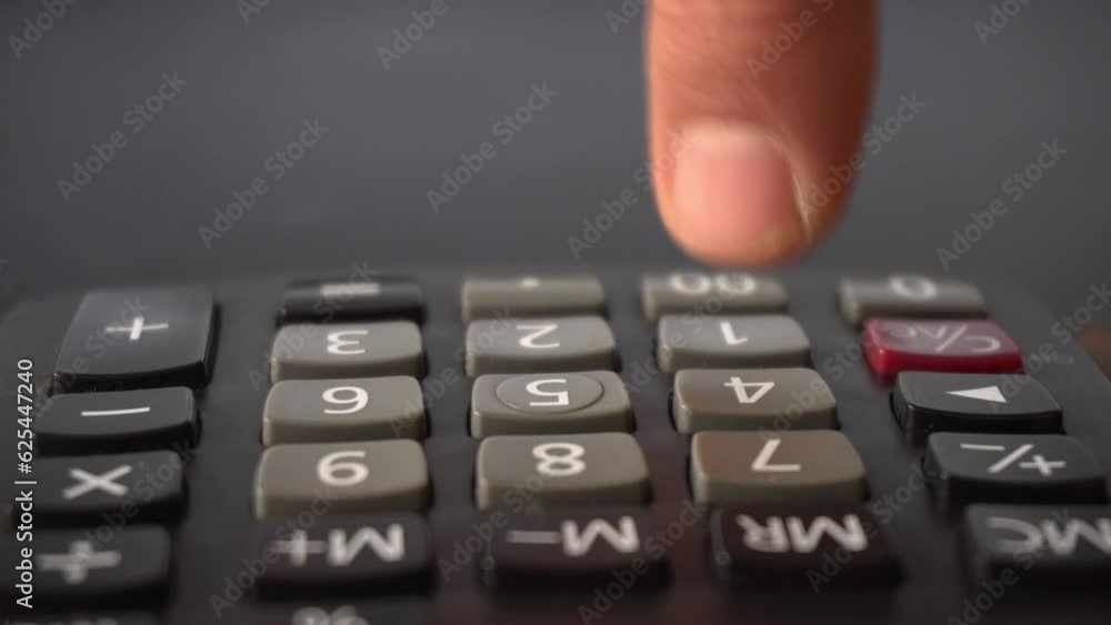 Calculating Taxes With Money And Calculator Calculating Taxes With Money And Calculator