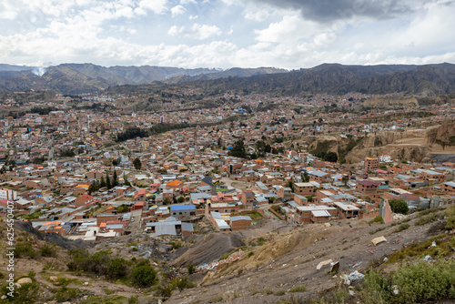 View from the scenic road to the landmark Muela del Diablo over the highest administrative capital, the city La Paz and El Alto in Bolivia