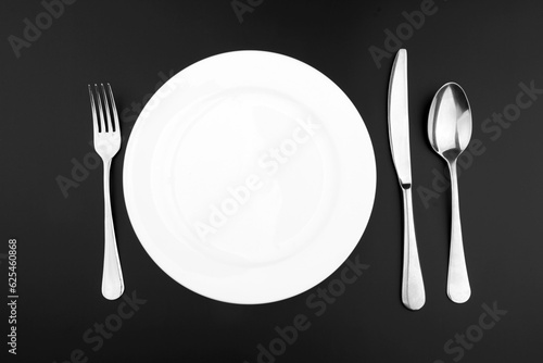 Cutlery with a plate