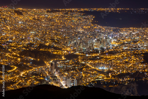 City lights of La Paz and El Alto, highest capital and vibrant city surrounded by the highest peaks of the Andes mountains in Bolivia, South America © freedom_wanted