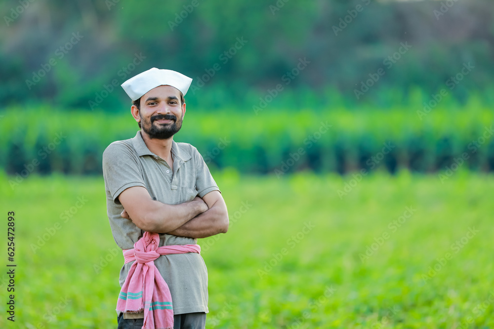 Maharashtra look farmer, happy farmer standing in Cwopea farm Maharashtra look farmer, happy farmer standing in Cwopea farm