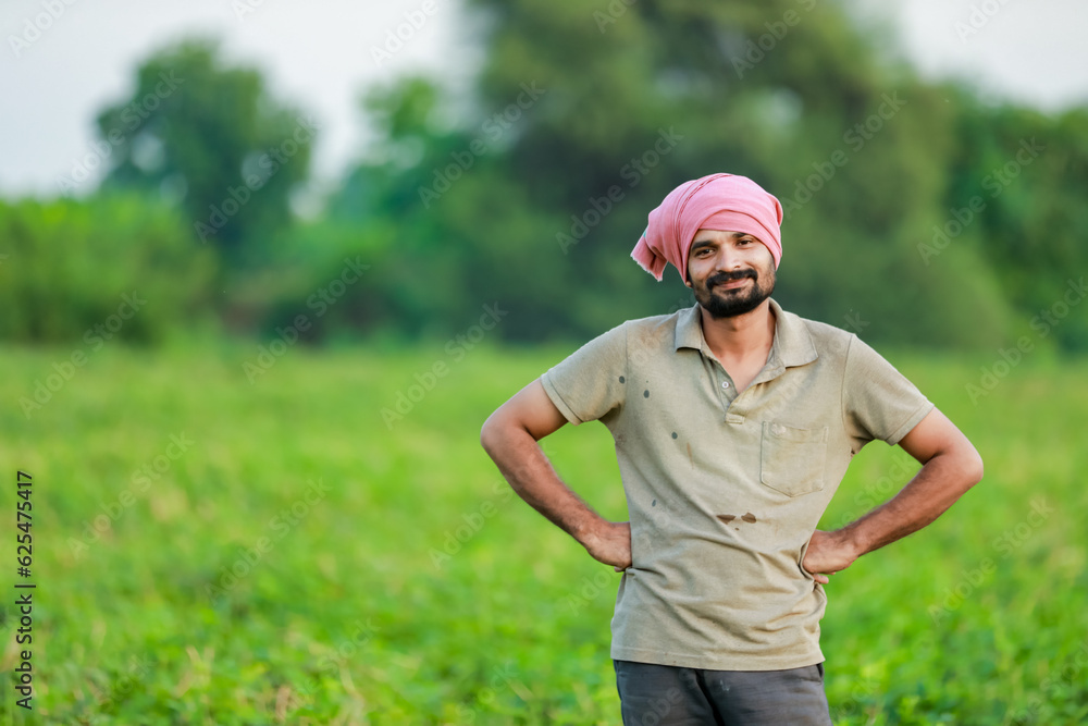 Maharashtra look farmer, happy farmer standing in Cwopea farm Maharashtra look farmer, happy farmer standing in Cwopea farm