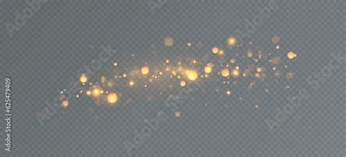 Golden sequins glow with many lights. Glittering dust. Luxurious background of golden particles.