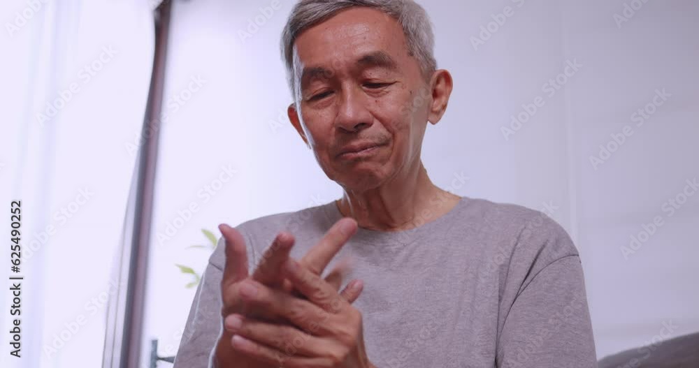An elderly man's hand is trembling because of Parkinson's disease. An elderly man's hand is trembling because of Parkinson's disease.