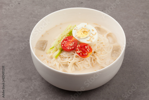 Noodles made by rolling in soybean soup. It is mainly eaten on ice in summer. photo