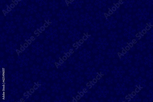 Dark blue background with bland texture in the form of snowflakes of various sizes. Christmas or winter decor.