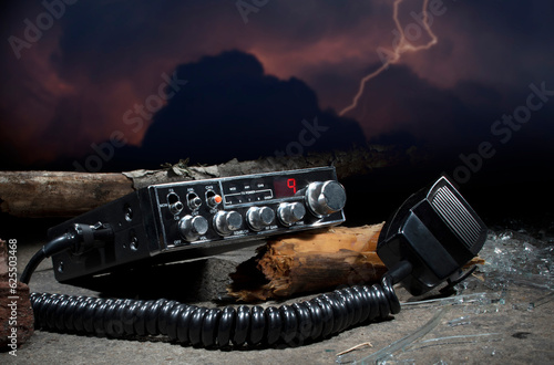 CB radio surrounded by debris during a storm photo