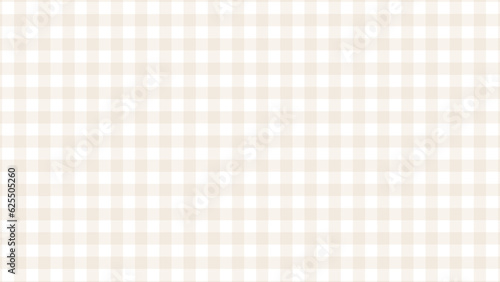 Beige and white plaid fabric texture as a background 