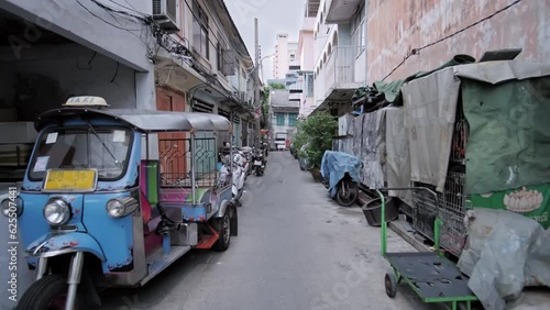 Bangkok, Thailand - 19.07.2023: Streets of Talat Noi district in Bangkok China Town full of streetart, historic buildings and typical thai alleys. Historical district, Traditional architecture, Local