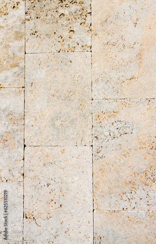 Landscaping - Texture of limestone tiles, directly above, close-up, terrace