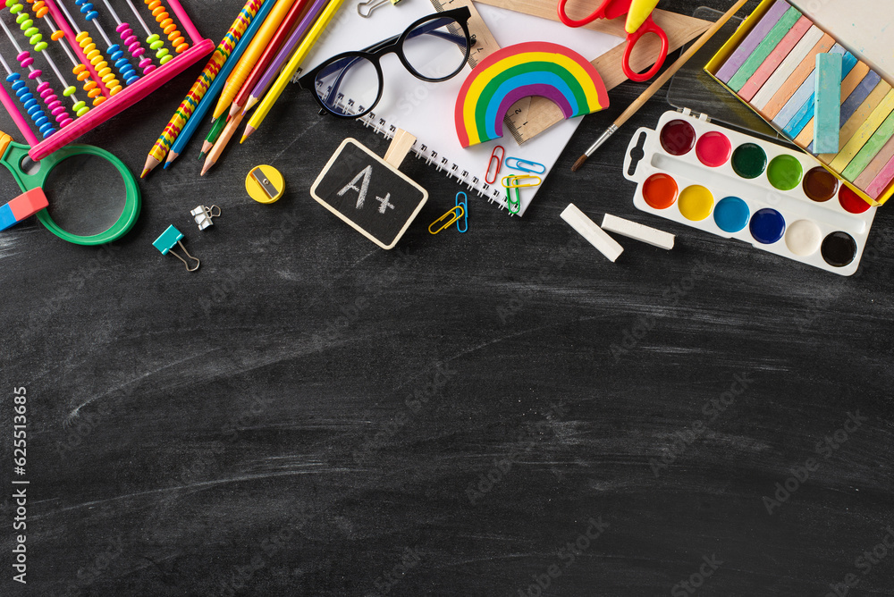 Elementary school assortment. Top view of color pencils, album, drawing ...