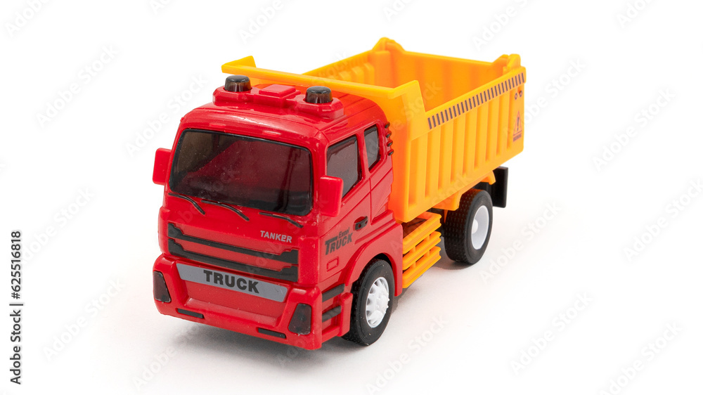 Model of toy dumper truck isolated on white. Model of toy dumper truck isolated on white.
