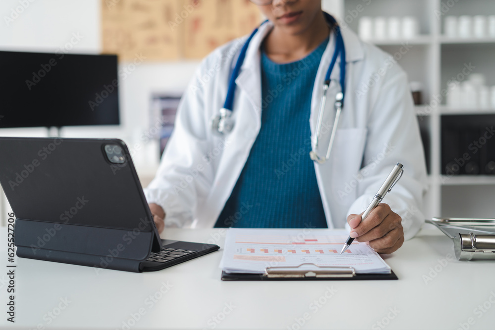 Pharmacist writing a medical diagnosis on paper in room clinic. Pharmacist writing a medical diagnosis on paper in room clinic.
