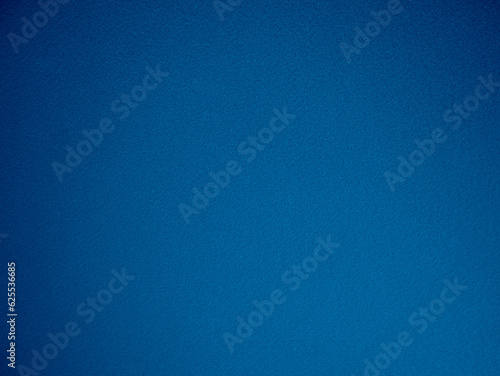 Felt blue soft rough textile material background texture close up,poker table,tennis ball,table cloth. Empty navy blue fabric denim background.
