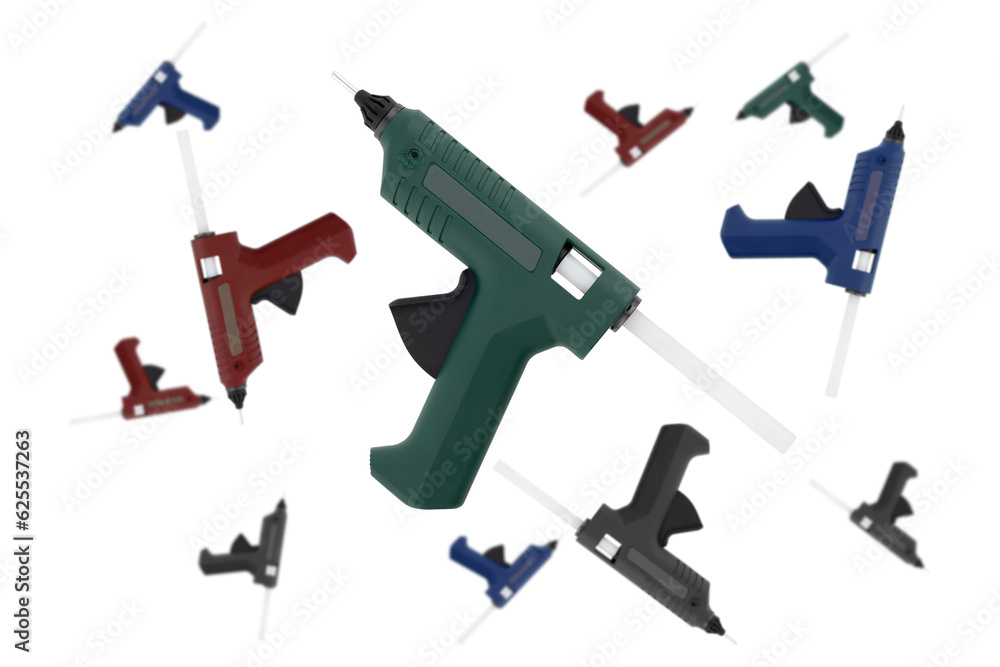 Glue gun on a white background. Electric glue gun close-up on a white background Glue gun on a white background. Electric glue gun close-up on a white background