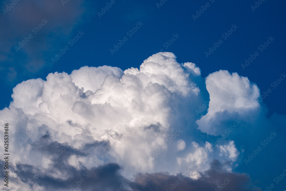 big white cumulus clouds on the blue sky big white cumulus clouds on the blue sky