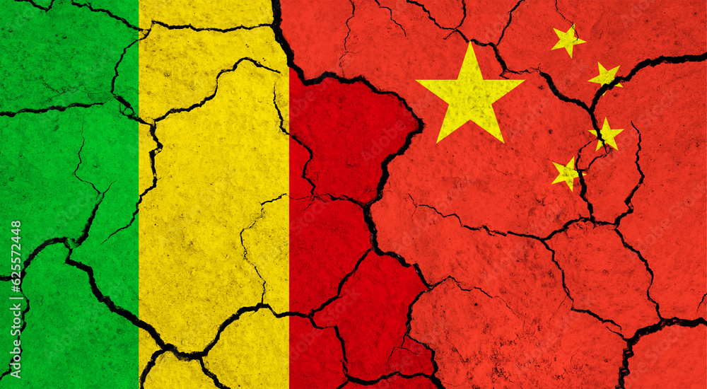 Flags of Mali and China on cracked surface - politics, relationship concept Flags of Mali and China on cracked surface - politics, relationship concept