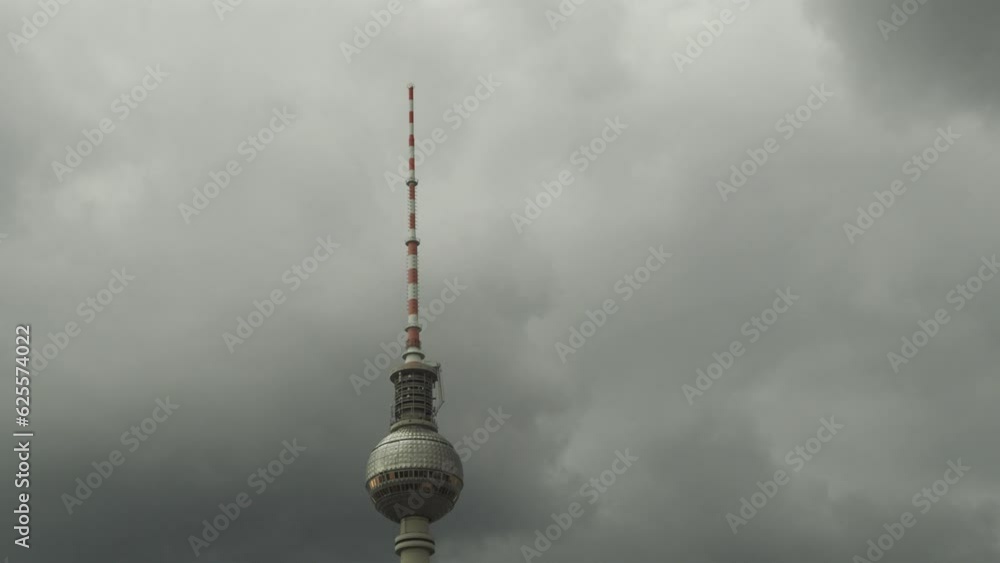 Dark clouds over the TV tower in Berlin. Rain clouds over the TV tower. Dark clouds over the TV tower in Berlin. Rain clouds over the TV tower.