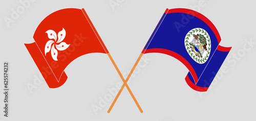 Crossed and waving flags of Hong Kong and Belize