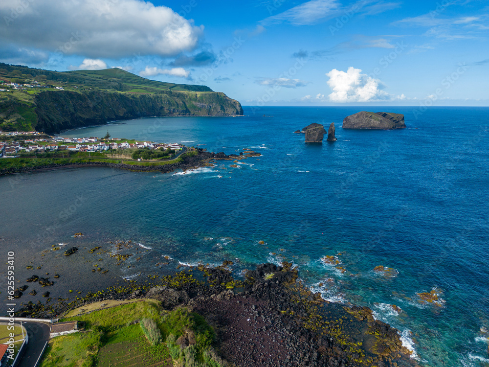 Fototapeta premium Ilheus dos Mosteiros, picturesque rock formations near little coastal town Mosteiros on Sao Miguel, Azores Islands, Portugal.