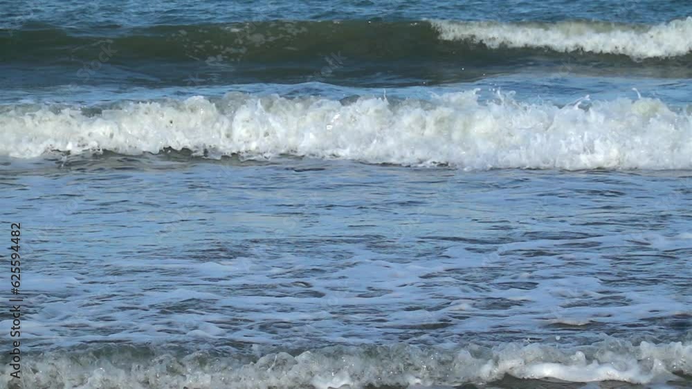 Slow Motion Shot Of Ocean Waves Crashing On Sandy Beach Slow Motion Shot Of Ocean Waves Crashing On Sandy Beach