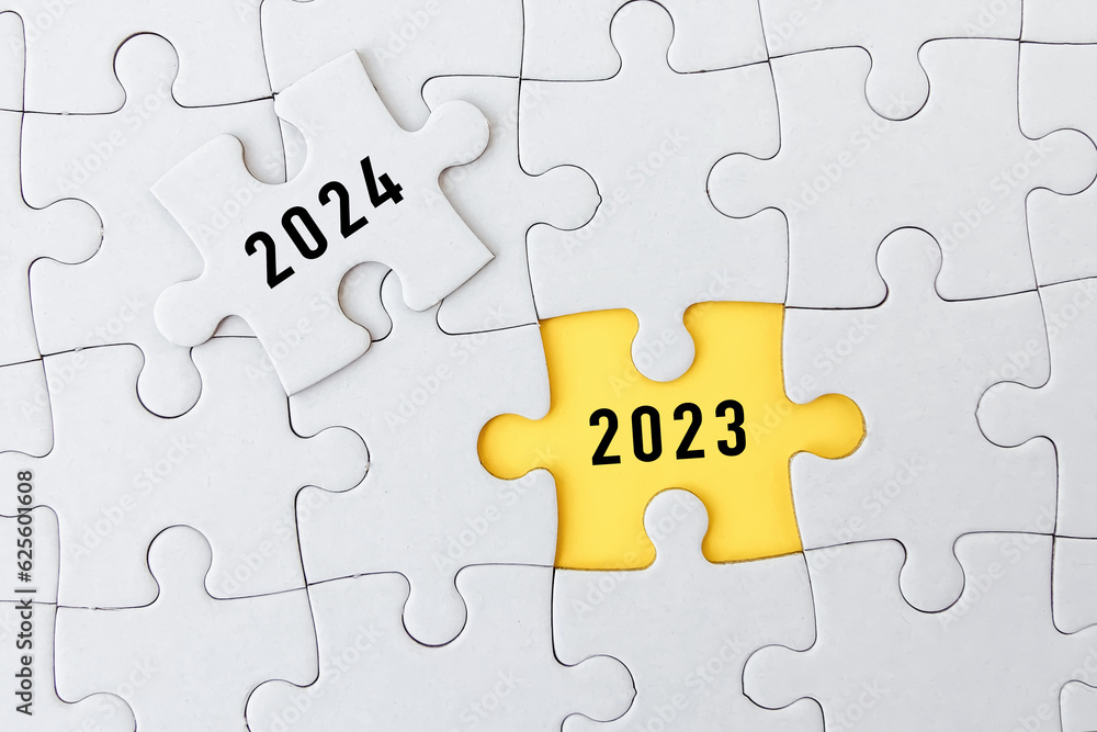 2023, 2024 on puzzle background, business concept. 2023, 2024 on puzzle background, business concept.