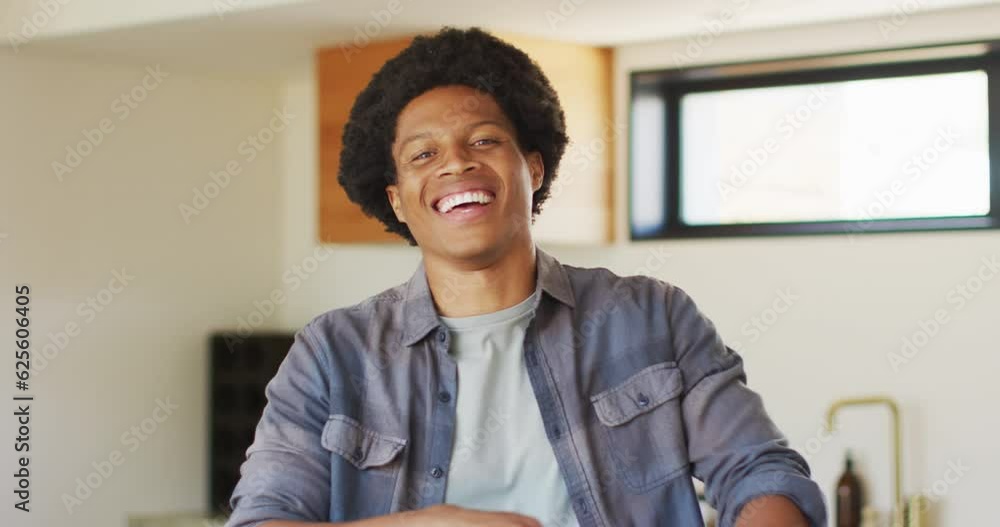 Happy african american man spending time alone at home Happy african american man spending time alone at home