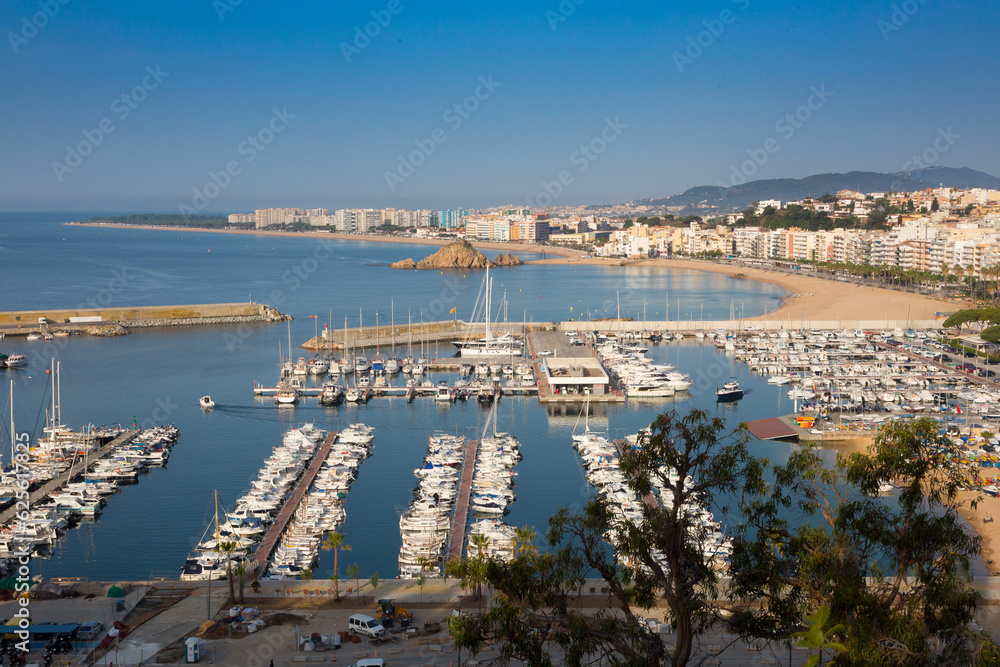 Aerial image of the marina and fishing port of Blanes, a town in the province of Barcelona and the beginning of the Catalan Costa Brava.
