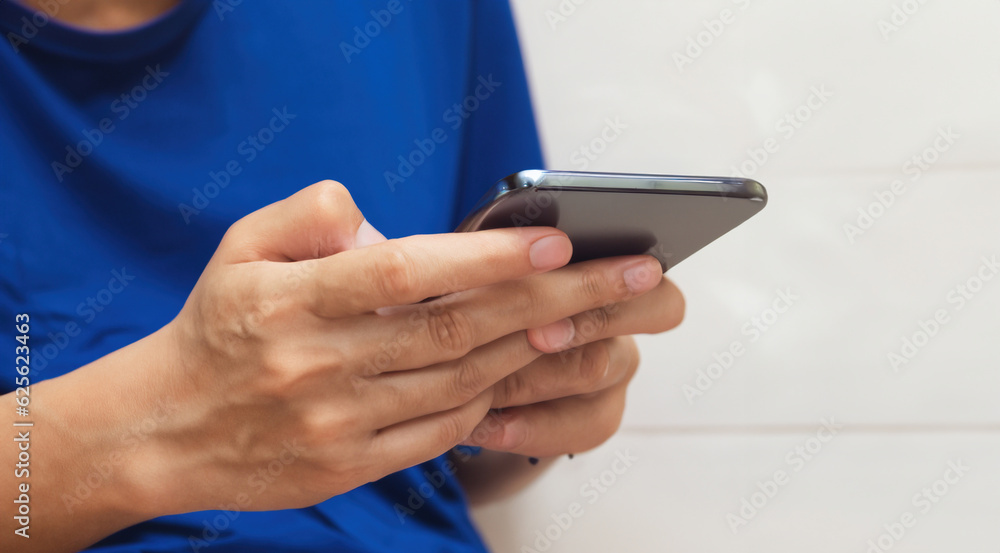 Modern Technology: Hand Holding Smartphone with Touchscreen, Digital Communication Concept Modern Technology: Hand Holding Smartphone with Touchscreen, Digital Communication Concept