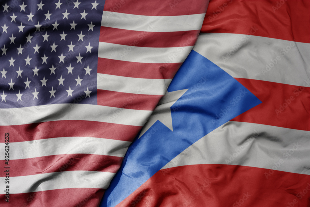 big waving colorful flag of united states of america and national flag of puerto rico . big waving colorful flag of united states of america and national flag of puerto rico .