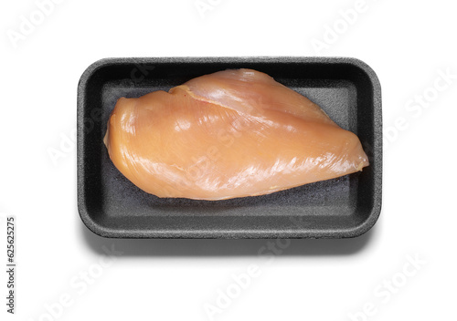 Raw chicken breast on a styrofoam tray from above with a semitransparent shadow