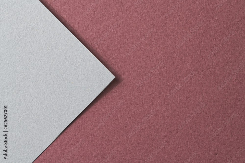 Rough kraft paper background, paper texture red burgundy gray colors. Mockup with copy space for text. Rough kraft paper background, paper texture red burgundy gray colors. Mockup with copy space for text.